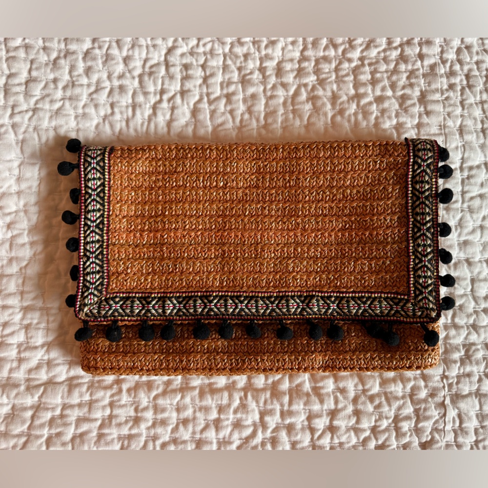 Brand new w. Tags. Elegant Tan Clutch with Orange & Black Accents